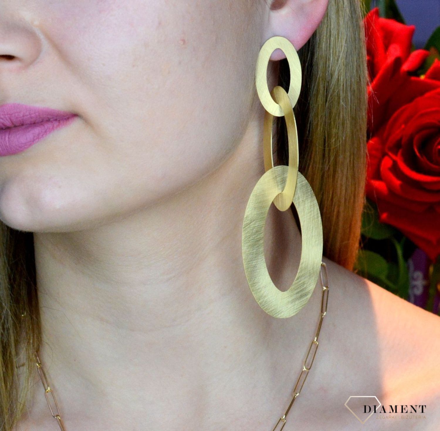 Srebrne kolczyki duże owalne w pozłoceniu OR AQ H0460304. Idealny pomysł na prezent. Kolczyki wykonane z najwyższej jakości srebra próby 925. Idealne kolczyki na uroczystość. Długość całkowita 11 cm..jpg